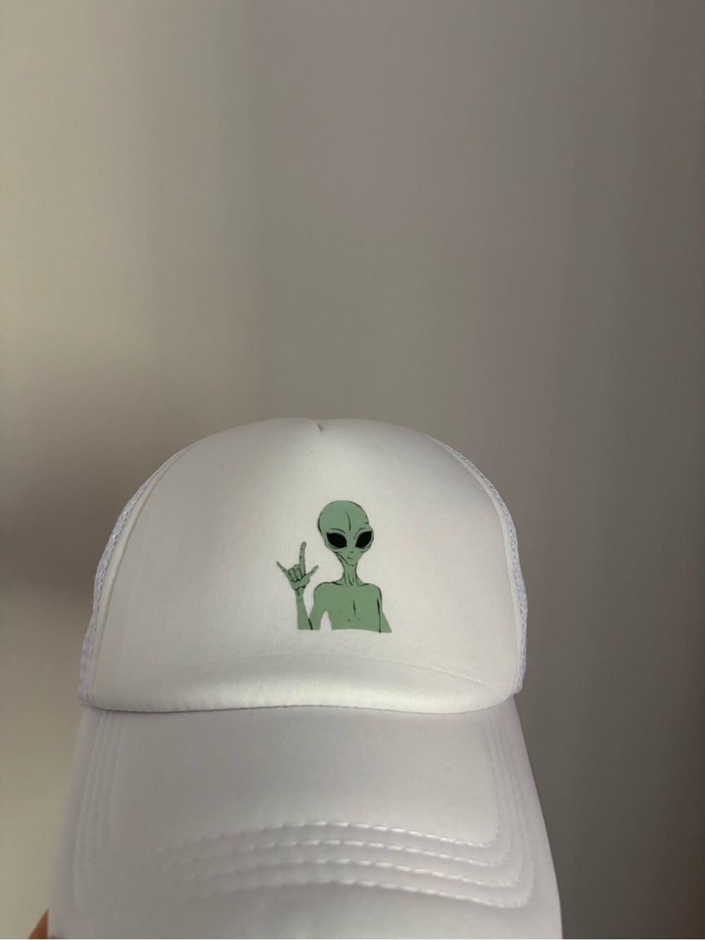 White Trucker Hat with Green Alien Graphic